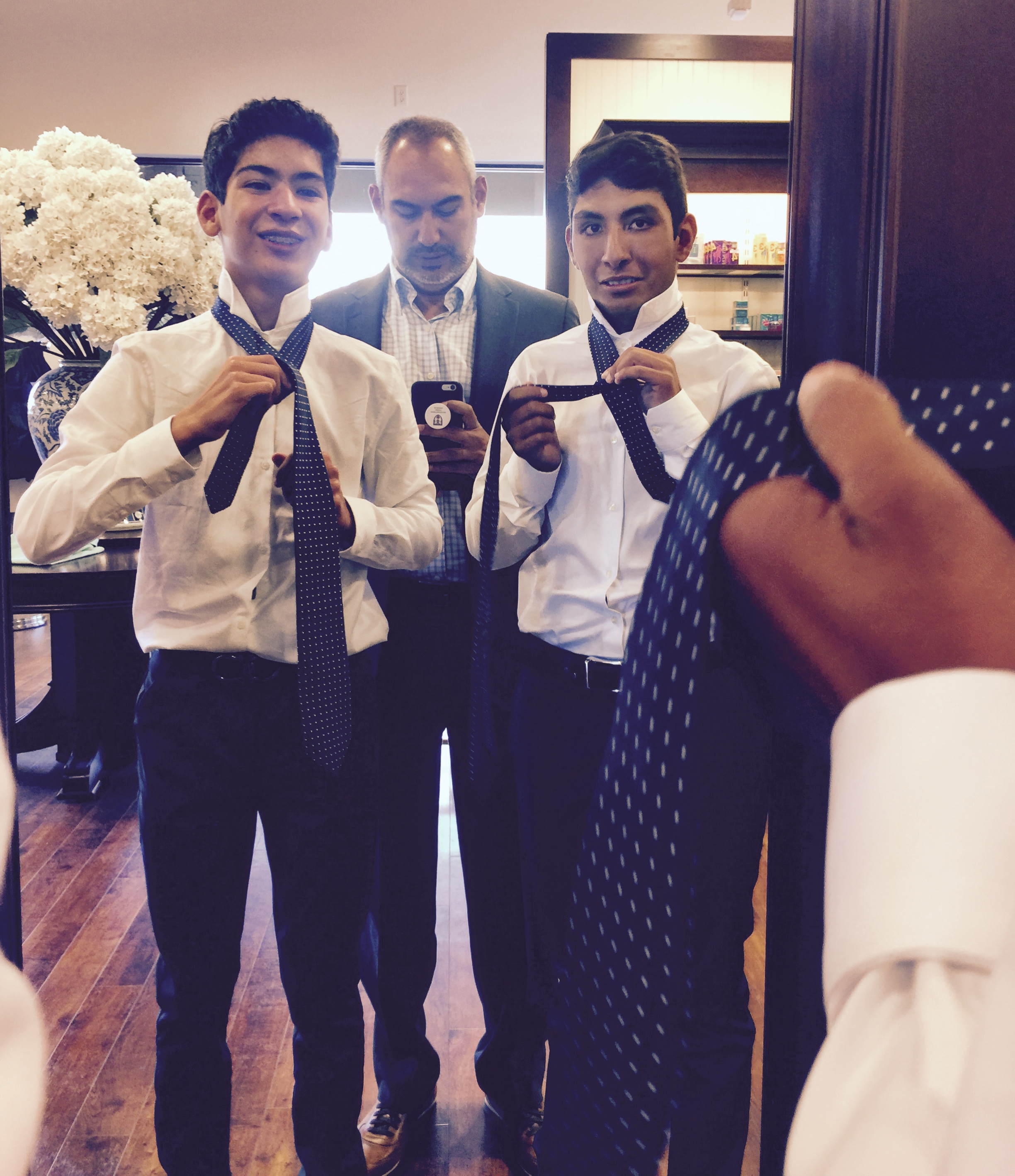 Garza brothers learning to tie
