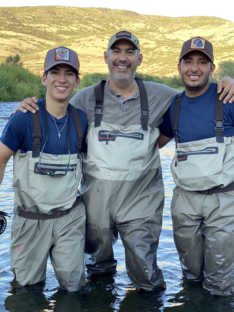 Fly fishing with sons on the river